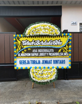 Papan Bunga Duka di Gedang